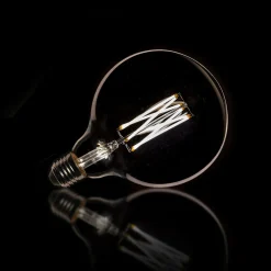 WoonStijl Lichtbron LED filament bol Ø12 5 - E27 6W 2100K 450lm dimbaar / Smoke grey glas